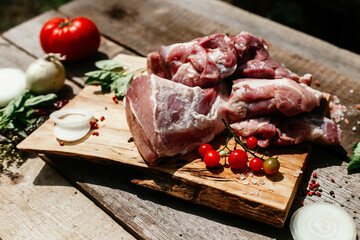 Pork pulp.raw piece of meat on a wooden board. 