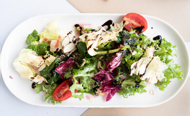 fresh salad on white plate