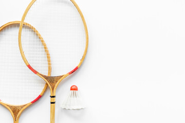 Competitive sports concept with badminton rackets and shuttlecock