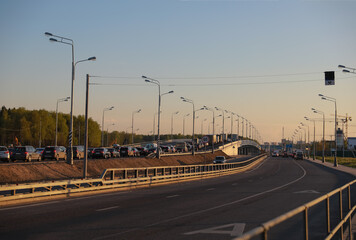 Traffic jam, a large group of cars on Friday night on the way to the cottage. Moscow