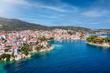 Naklejka na ściany i meble Aerial view to the idyllic town of Skiathos island, Sporades, Greece, during summer time