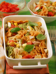 Pasta salad with farfalle and vegetables.