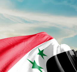 Syria national flag cloth fabric waving on the sky with beautiful sun light - Image