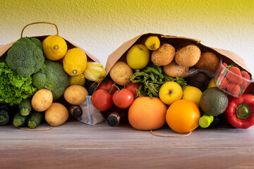 Paper shopping bags for home delivery of food and drink for people in quarantine for Covid-19 coronavirus pandemic. Stay at home concept