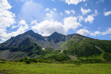 Naklejka premium Landscape. A mountain range around the crater of an ancient volcano. Vachkazhets volcano. Kamchatka Peninsula