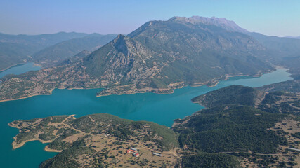 Aerial drone photo of huge fjord looking lake of Mornos a clear water supply for Attica region, Fokida prefecture, Greece