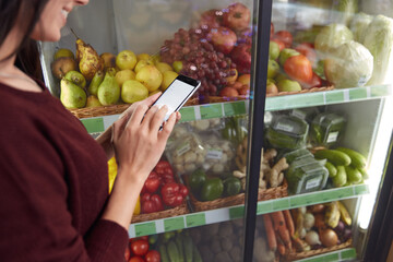 Woman search information about products on phone