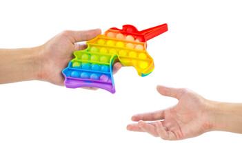 Passes a Pop it in the shape of a unicorn. Close up. Isolated on a white background