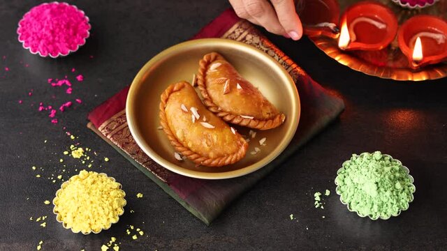 Gujiya, Karanji, Gujia Indian Sweet dessert mithai festival sweet deep-fried dumpling Diwali, Dussehra, Holi ganesh chaturthi, Ram navami, Durga pooja 4k footage video Navratri Mumbai, Kerala, India.	