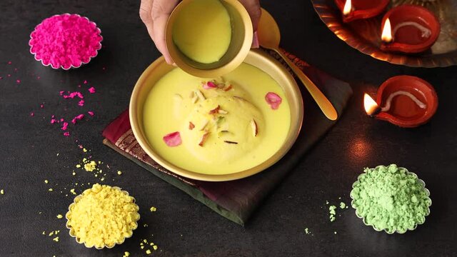 Rasmalai Ras malai Rasamalei Indian Sweet dessert mithai milk sweet 4k footage video Diwali Dussehra Holi ganesh chaturthi Ram navami Durga pooja ashtami Navratri festival Mumbai Bengal India Pakistan