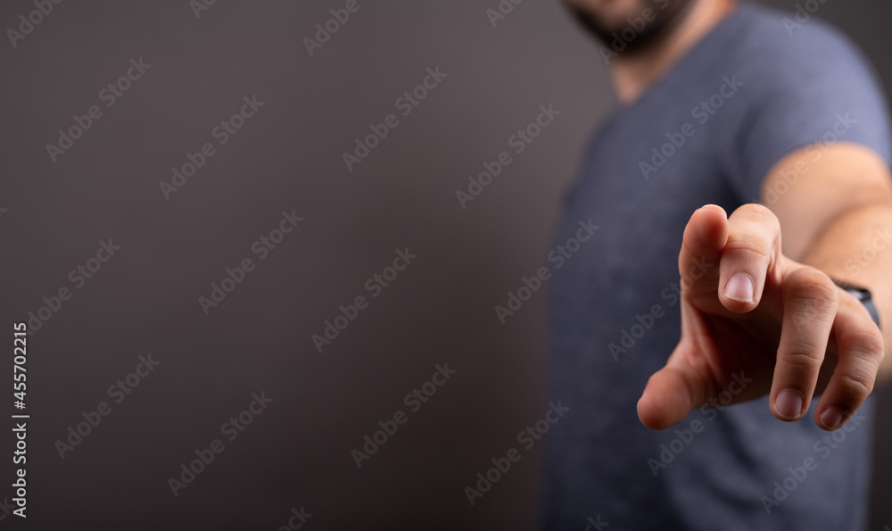 Poster man showing his empty hand.