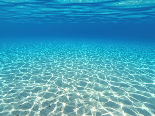 Underwater sea level split photo of beautiful paradise turquoise exotic island beach in Caribbean...