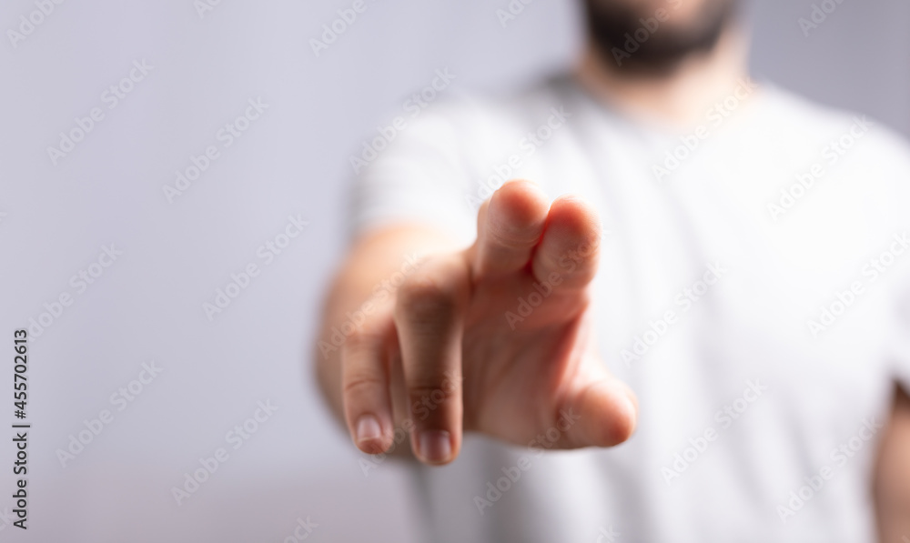 Poster Hand pushing on a touch screen..