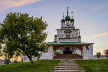 Obraz premium View of the old Trinity Church in the provincial town of Solikamsk (Northern Ural, Russia) on a summer morning. A majestic temple on a hill with many domes is the decoration of the city. 