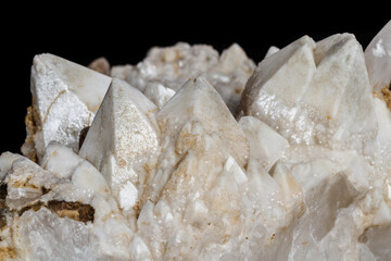 Macro mineral stone Snow quartz with calcite on a black background