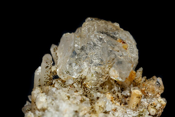 Macro mineral stone fluorite with quartz against black background