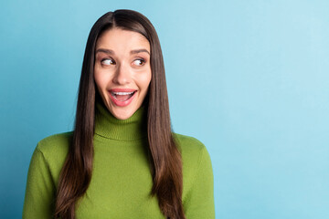 Portrait of attractive amazed cheerful foxy cunning girl looking aside copy space isolated over...