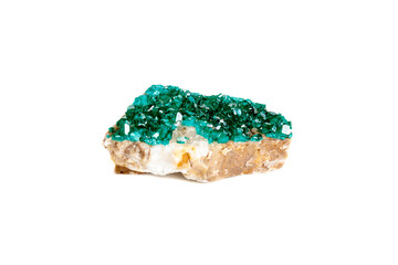 Macro mineral stone Dioptase silicate copper on a white background