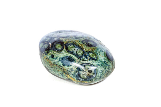 Macro mineral stone jasper kambaba on a white background