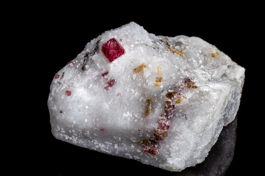 Macro mineral stone Spinel on a black background