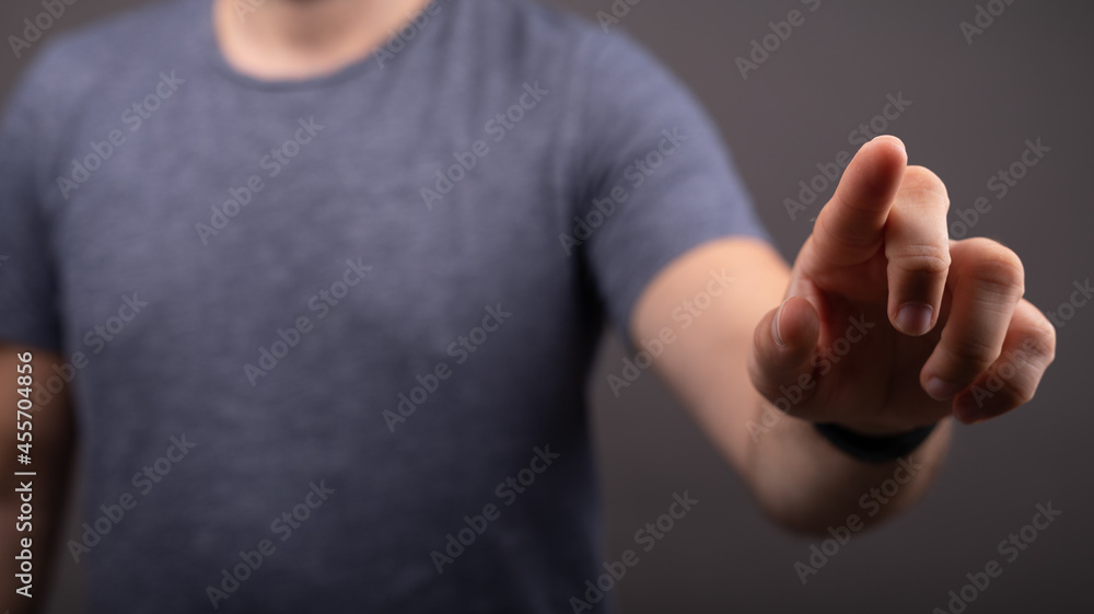 Poster Businessman pointing or touching finger in screen..