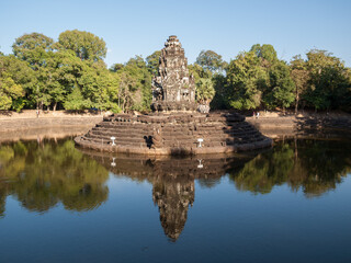 Fototapeta na wymiar Preah Neak Pean a Buddhist temple from the late 12th century formed by a large square pool, surrounded by four smaller ones, and a central island