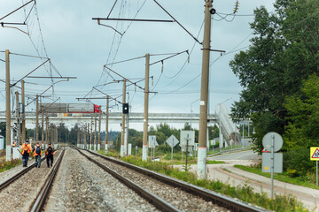 the railway tracks stretch into the distance to the horizon. gravel is poured on the sleepers...