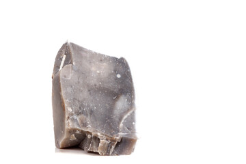 Macro mineral stone Flint in the rock on a white background