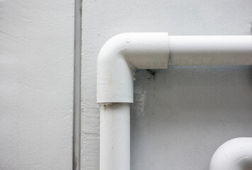 Household water supply system installed in the house. There are sewer pipes and clean water and faucets.