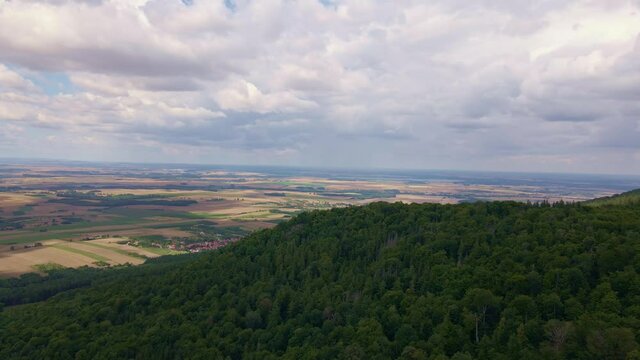 Drone flight over mountain village with forests. Sleza mountain near Wroclaw in Poland. Nature background, aerial view