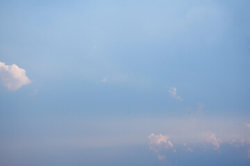 Blue sky and clouds background.