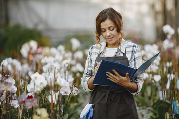 Woman working in a greenhouse