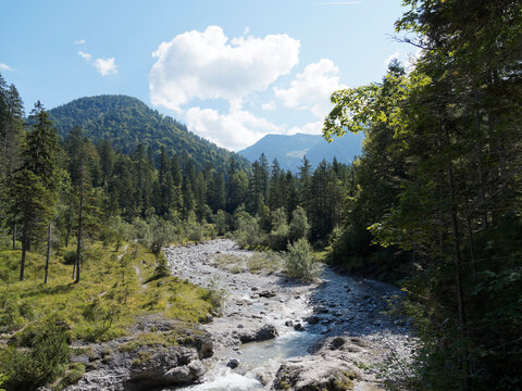 Upper Bavaria. Wei&szlig;ach river and small cascade in Kreuther Tal between Bavarian forest at foot of mangfall mountains near Tegernsee