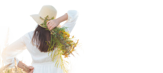 A woman holding a bouquet of herb, a natural medicine. BANNER - Natural medicinal product. Text...