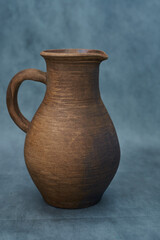   Ceramics, a ceramic product made with your own hands, made on a potter's wheel, a jug, a mug, clay.       