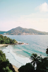 Beautiful coastline blue water cliffs and mountains background.