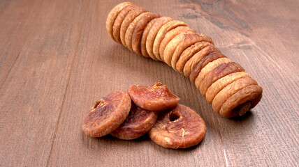 Fresh Figs or Anjeer fruit healthy vegan food concept organic dry fruits on wooden background.
