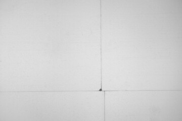 White foam boards glued to the wall