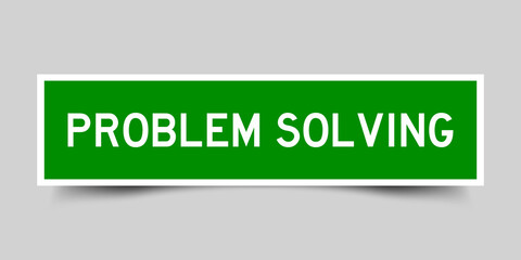Square label banner with word problem solving in green color on gray background