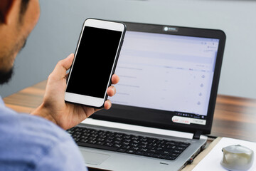 Man using mobile smartphone computer