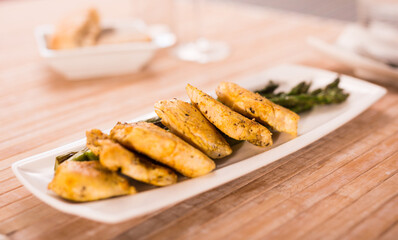 dietary meal rich in protein. Stir fried chicken breast and green asparagus