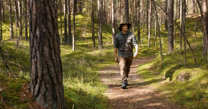 park ranger or forester on the forest walk