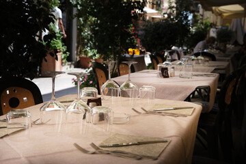 tables set outdoors in a restaurant