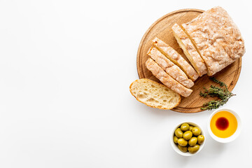 Olive oil on slice of bread with olives. Italian food appetizer