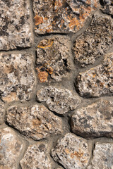 Background. Stone wall texture. The shell rock material is bonded with cement mortar