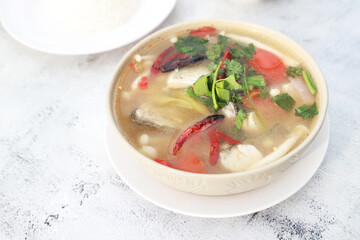 Spicy soup snapper fish, Thai call Tom yum snapper fish. Thai soup with fish chilli and vegetable. Favorite food in Asian