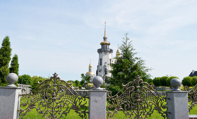Christian church cross in high steeple tower for prayer