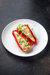 stuffed pepper vegetables, mushrooms, cheese, no meat fresh portion ready to eat meal snack on the table copy space food background rustic. top view keto or paleo diet veggie vegan or vegetarian food