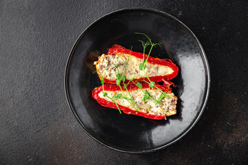 stuffed pepper vegetables, mushrooms, cheese, no meat fresh portion ready to eat meal snack on the table copy space food background rustic. top view keto or paleo diet veggie vegan or vegetarian food