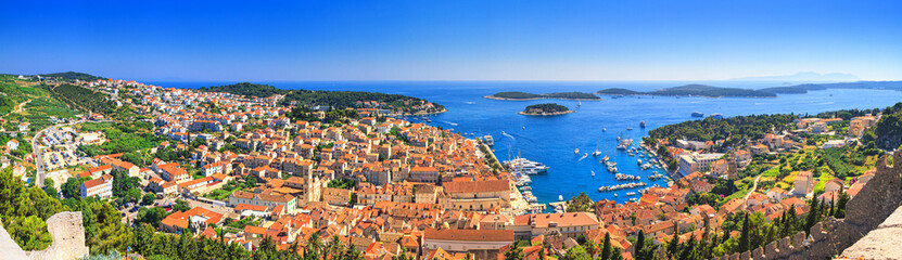 Fototapeta na wymiar Coastal summer landscape, panorama - top view of the town of Hvar and the City Harbour with marina, on the island of Hvar, the Adriatic coast of Croatia